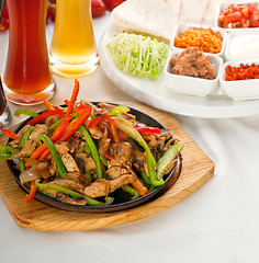 Image showing original fajita sizzling hot  on iron plate