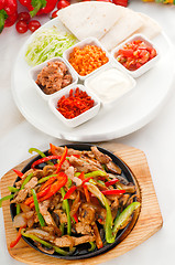 Image showing original fajita sizzling hot  on iron plate