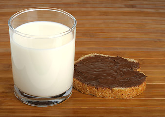Image showing milk and a sandwich with peanut butter