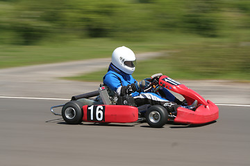 Image showing Speeding red go-kart