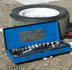 Image showing Car mechanic tools and tire