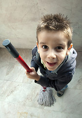 Image showing Children who clean the floor