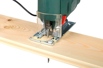 Image showing sawing wood board electric jigsaw