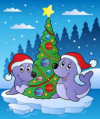 Image showing Two seals with Christmas tree