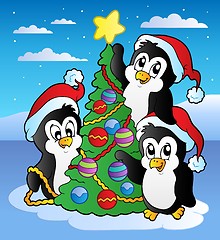 Image showing Christmas scene with three penguins