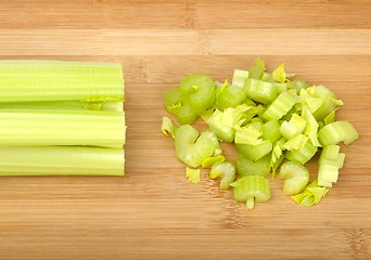 Image showing celery on a wooden board