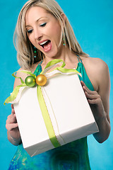 Image showing Gift present bring a smile to a woman