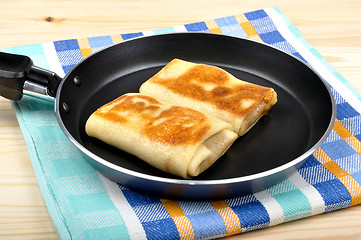 Image showing pancakes in a frying pan