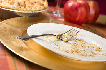 Image showing Apple Pie and Empty Plate with Remaining Crumbs