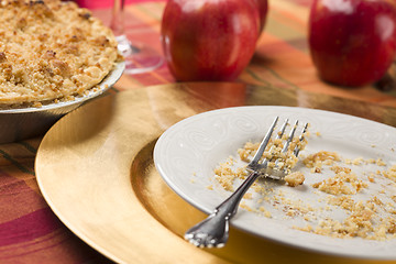 Image showing Apple Pie and Empty Plate with Remaining Crumbs