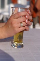 Image showing a woman drinking beer