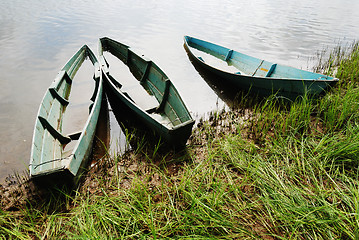 Image showing three wooden boats