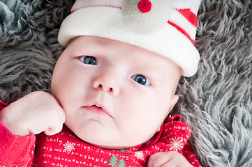 Image showing Little cute baby in red