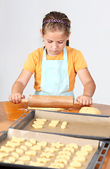Image showing Child baking cookies
