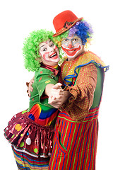 Image showing A couple of smiling clowns dancing