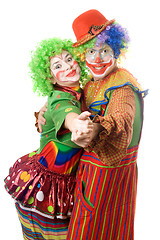 Image showing A couple of happy clowns dancing