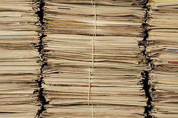 Image showing Piles of newspapers to be recycled