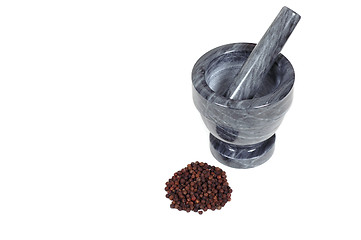 Image showing Mortar and pestle with peppercorns