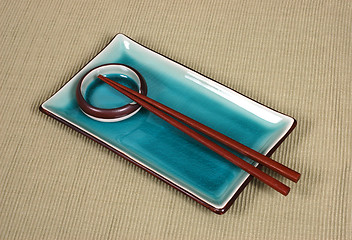 Image showing Plate, dipping bowl and chop sticks