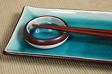 Image showing Plate, dipping bowl, with chop sticks