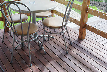 Image showing table and chairs on the terrace 