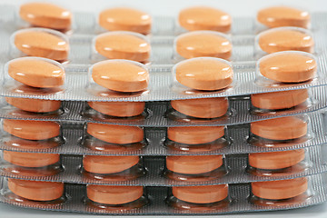 Image showing orange pills