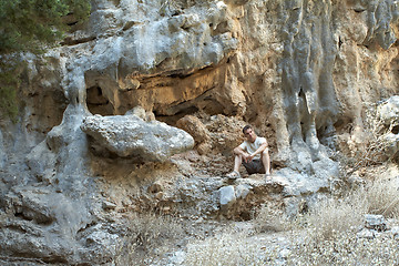 Image showing Rock Climber have a rest mountains