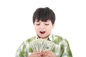 Image showing A smiling little boy is counting money - on white background 