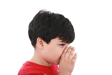 Image showing a boy is telling a secret with a hand symbol