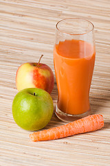 Image showing Carrots, apple and juice