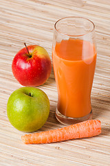 Image showing Carrots, apple and juice