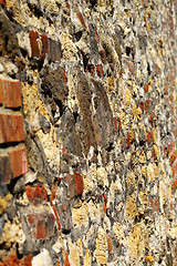 Image showing old stone and brick wall in perspective