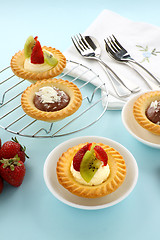 Image showing Cream And Chocolate Tarts