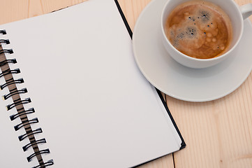 Image showing Notebook and Coffee