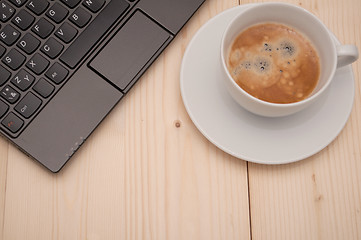 Image showing Laptop and Coffee