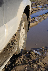 Image showing wheel in a puddle