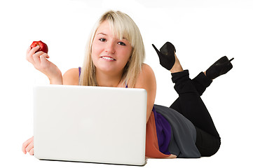 Image showing Young smiling girl with laptop