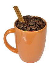 Image showing coffee beans and cinnamon in a mug