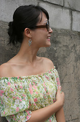 Image showing Side profile of a woman wearing big shades