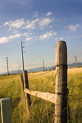 Image showing Wooden Gate with Electric Pole and Blue Skies on the Background