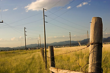 Image showing Fence in the Field with Blue Background