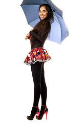 Image showing Playful young woman with umbrella