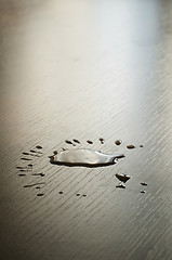 Image showing Spilled water on a table