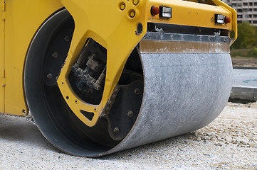 Image showing Roller tamping gravel