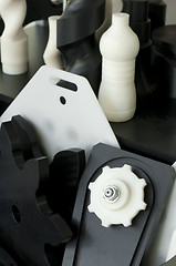 Image showing Plastic machine parts. Vertical imagel