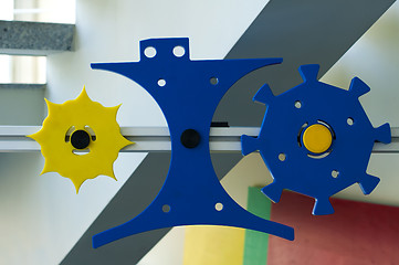 Image showing Plastic machine parts. Vertical imagel