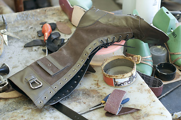 Image showing Handmade manufacture of footwear.Unfinished boot