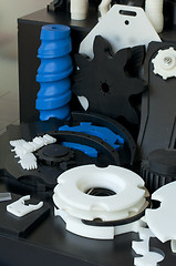 Image showing Plastic machine parts. Vertical imagel