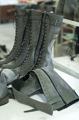 Image showing Boots arranged on shelves