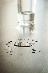 Image showing Spilled water on a table